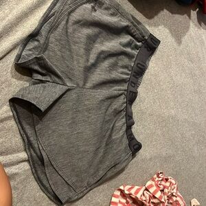 under armor, dark gray shorts, size medium